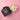 Delicious Coconut Apricot Balls in a bowl and packaging on a pink background