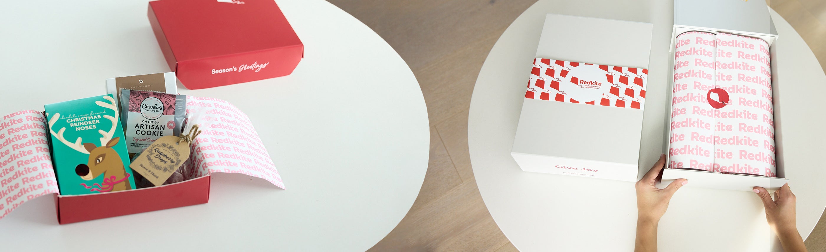 Product packaging with a red box and branded items on a table.