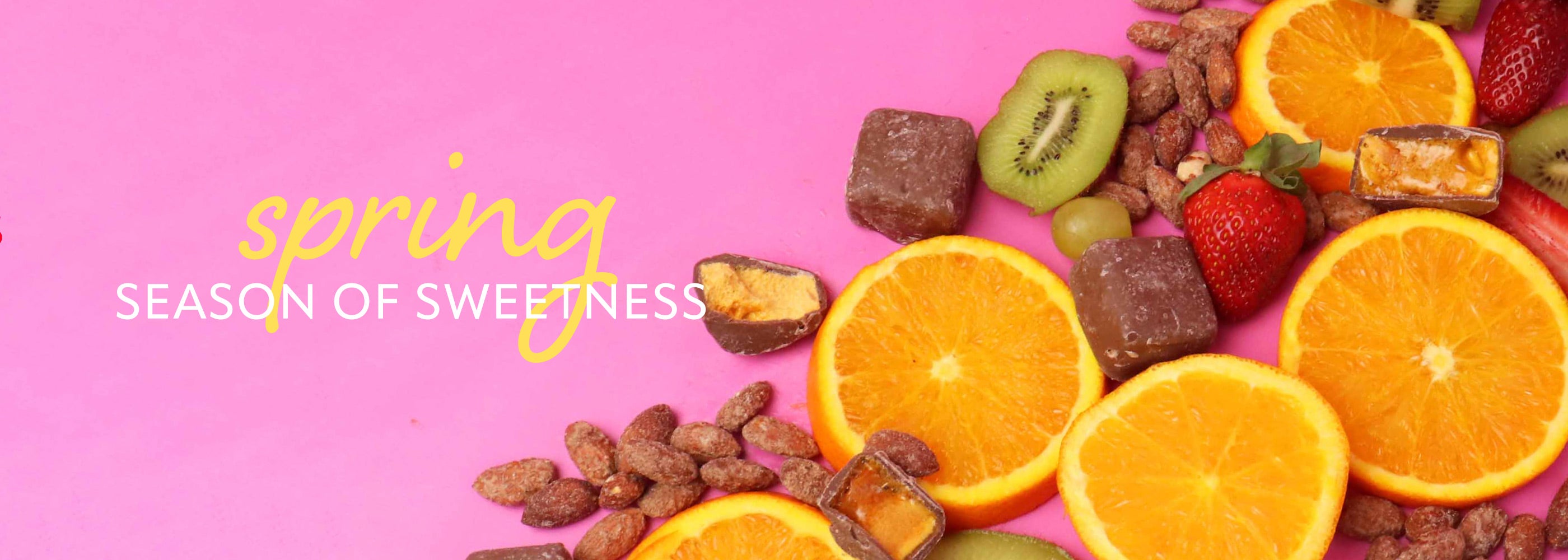 Oranges, strawberries, and chocolate on a pink background with 'spring season of sweetness' text.