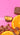 Oranges, strawberries, and chocolate on a pink background with 'spring season of sweetness' text.