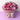 Bouquet made of pink flowers and chocolate candies on a purple surface